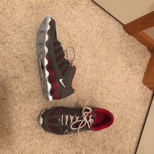 Gray and Red Nike shoes size 9.5